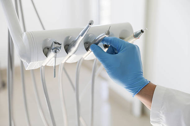 Professional Invisalign Clear Aligners technician working in Malden, MA